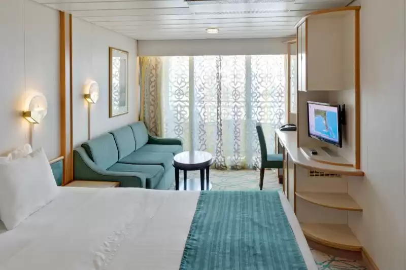 Cabina con balcón espaciosa con vista al mar y al atardecer